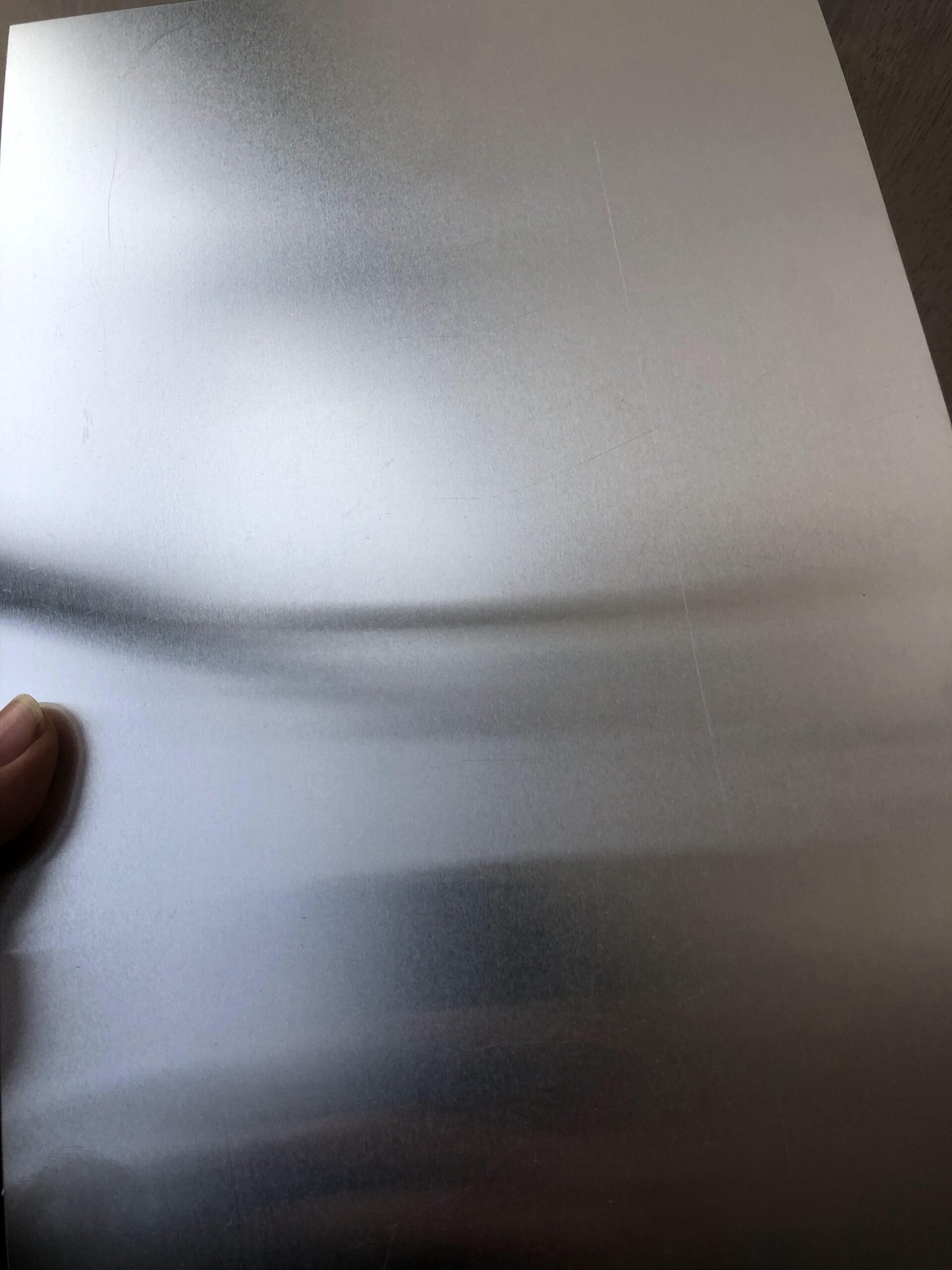 Close view of an aluminum sheet surface